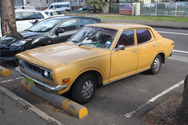 1972_Datsun_180B__P610__Deluxe_sedan__20651657636_.jpg