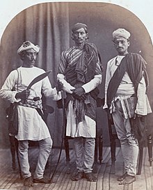 220px-From_left_to_right-_A_Gurkha__a_Brahmin_and_a_Sood.jpg