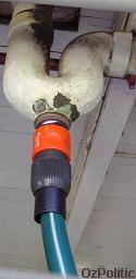 garden hose fitted to S bend below shower, click for a larger image